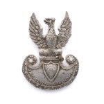 An eagle with the eye of providence and the inscription "For the Fatherland and Freedom."
