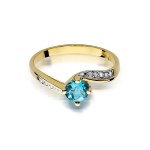 Gold ring with diamonds and topaz