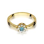 Gold ring with diamonds and topaz