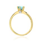 Gold ring with diamonds and topaz