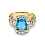 Gold ring with diamonds and topaz