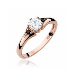 Gold ring with white sapphire