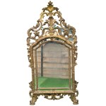 Gilded and carved wooden mirror