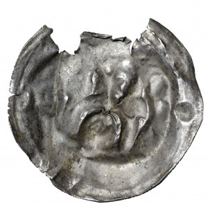 Brakteat, II połowa XII wieku, głowa pod łukiem, gwiazda