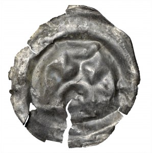 Brakteat, II połowa XII wieku, głowa pod łukiem ozdobnym