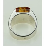Ring with amber, author