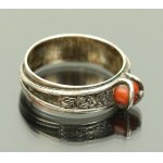 Silver ring with coral, author