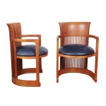 PAIR OF ARMCHAIRS BASED ON A DESIGN BY, FRANK LLOYD WRIGHT (1867 - 1959)