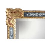 MIRROR IN AN ARTISTICALLY CARVED FRAME