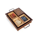 GAME SET, GAME PIECES IN FOUR WOODEN BOXES ON A TRAY