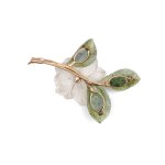 FLOWER BROOCH WITH A SAPPHIRE, 14-KARAT YELLOW GOLD