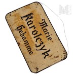 Plaque/Advertising sign "Marja Karolczyk Acousin"/"Marie Karolczyk Hebamme".