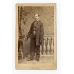 Man with cornet and insurgent buckle, photo by A. & F. Zeuschner, Poznań (166)