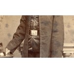 Man with cornet and insurgent buckle, photo by A. & F. Zeuschner, Poznań (166)