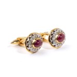 Gold cufflink with diamonds and rubies
