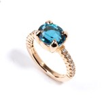 Blue topaz diamond ring