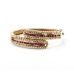 Rigid gold bracelet with diamonds and rubies