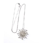 Necklace with a gold diamond pendant