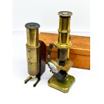 Two antique brass microscopes, one in a box
