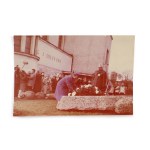 A photograph of Margaret Thatcher laying flowers on Jerzy Popiełuszko