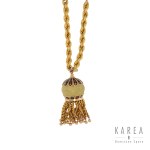 Gold jewelry set: sautoir necklace with clasp and bracelet, late 19th century.