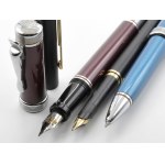 Pens - Lot of 3 fountain pens. Of note is a Parker with body ...