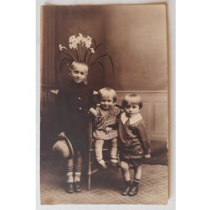 Three children in Końskie. Artistic photograph by A. Borowiec in Końskie.
