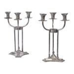 A pair of candelabra triple candlesticks