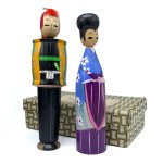 Pair of kokeshi in original box from the "History of Clothing" series, Meji era clothing