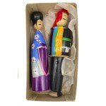 Pair of kokeshi in original box from the "History of Clothing" series, Meji era clothing
