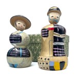 Pair of kokeshi in original box from the "History of Clothing" series, Sengoku era clothing