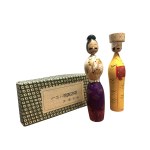 Pair of kokeshi in original box from the "History of Clothing" series, clothing from the Muromachi period
