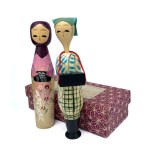 Pair of kokeshi in original box from the Clothing History Series Period clothing from the late Edo period