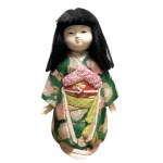 Kimekomi ningyo- girl doll in green kimono, 1960s