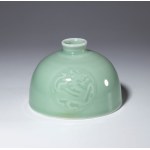 A small celadon-glazed porcelain water pot. China, Republic period (1912-1949).