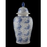 Large porcelain vase with a lid decorated with a carp motif on a plant background. China. 20th century.