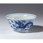 A small blue-painted porcelain bowl depicting dragons among clouds. China, Republic period (1912-1949).