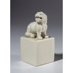 Porcelain seal with a lion-shaped handle. China, early 20th century.