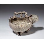A crackled-glaze ceramic bowl in the shape of a fruit. China, 20th century.