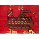 War rug. Colored wool and cotton. Afghanistan, ca. 1990.