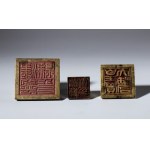 Group of three metal seals. China, 19th century.