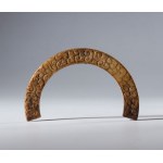 A Hotan jade crescent-shaped ornamental pendant in the style of the Han Dynasty (206 BC to 220 AD). China, Ming Dynasty (1368-1644), 16th century.