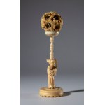 Small sculpture with a turned base and a spirit sphere (鬼功球 “guĭ gōng qiú”) in elephant ivory. China, 19th century
