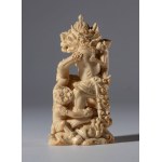 Finely carved marine ivory group depicting Garuda with monkeys and a demon. Indonesia, 19th century.