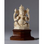 Small ivory elephant sculpture on a wooden base depicting Ganesha. India, 19th century.