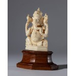 Small ivory elephant sculpture on a wooden base depicting Ganesha. India, 19th century.