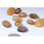 Lot of 50 worked carnelians with inscriptions, Lot of 50 worked carnelians with inscriptions
