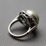 Warmet. Large ring with jade.