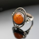 Metalwork. Amber ring.