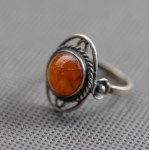 Metalwork. Amber ring.